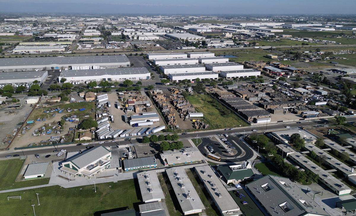 West Fresno Middle School and West Fresno Elementary School, bottom, are seen just west of Elm Street, the center of a controversial rezoning plan in Southwest Fresno Photographed Wednesday, March 18, 2026.
