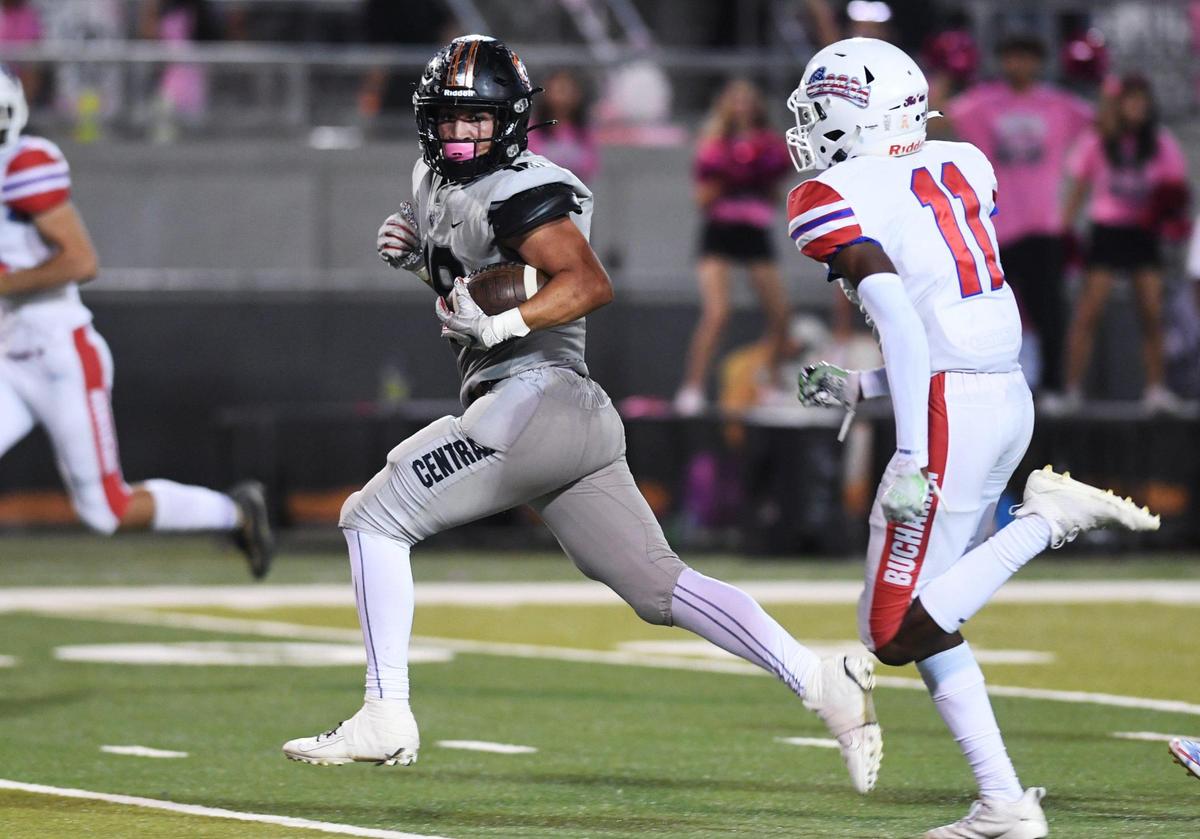 Central’s Braylen Hall, left, is pursued by Buchanan’s Joshua Dunu, right, as he runs for a touchdown Friday, Oct. 7, 2022 in Fresno. Buchanan won 49-41.