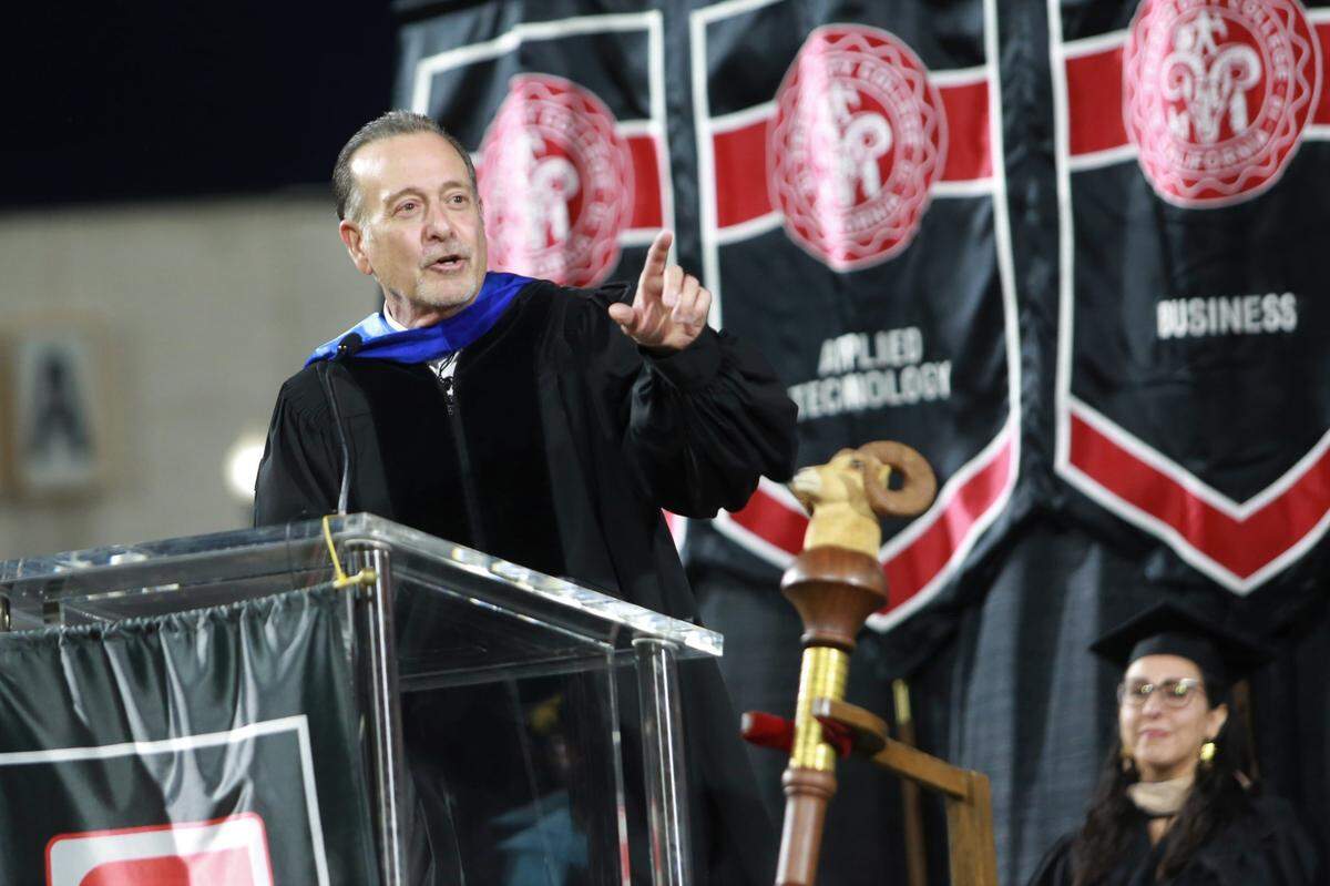 Fresno County Superintendent Jim Yovino shares wisdom with Fresno City College graduates Friday night (June 3) at Chukchansi Park.