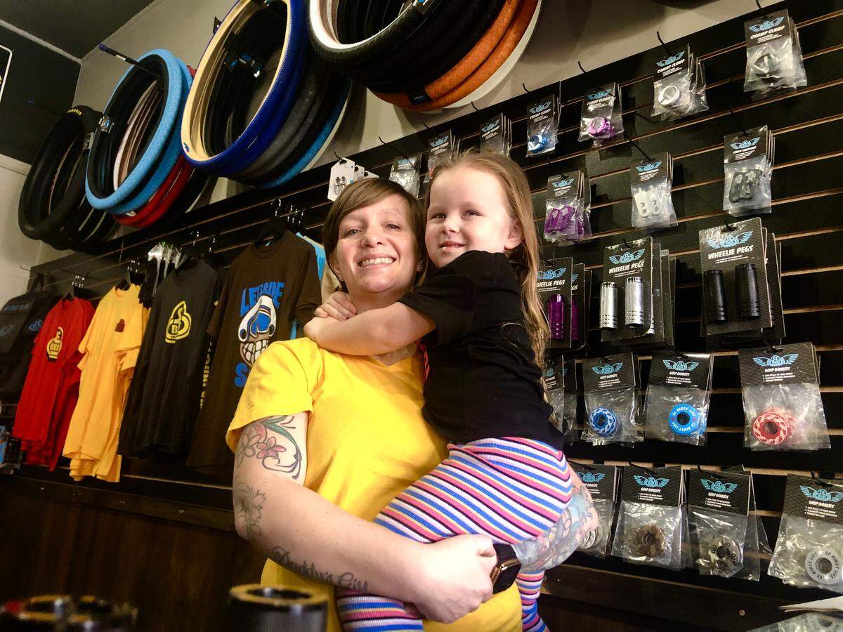 New family-owned Awesome Bike Company in Old Town Clovis offers bikes, repairs and cycling education, run by longtime cyclists Ashley and Tommy Merriott. 3-year-old daughter Penelope (right) also helps around the shop.