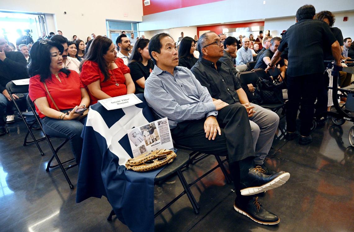 An honory seat is left for Satoshi “Fibber” Hirayama surrounded by the Hirayama family as hundreds gathered for a ribbon-cutting ceremony held for Clovis Unified’s newest school Hirayama Elementary Wednesday morning, Aug. 14, 2024 in Fresno. Satoshi Hirayama, who was interned during WWII, was a student athlete at Fresno State, then drafted into the MLB St. Louis Browns, then served in the U.S.Army during the Korean War. Mr Satoshi taught at Clovis High and was the first principal of Gateway High School.