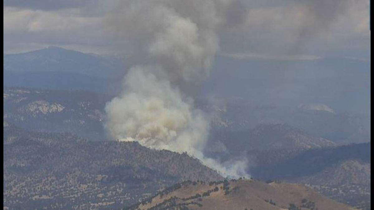 Firefighters are fighting a wildfire near Tollhouse Road and Burrough Valley Road in Fresno County, according to officials.