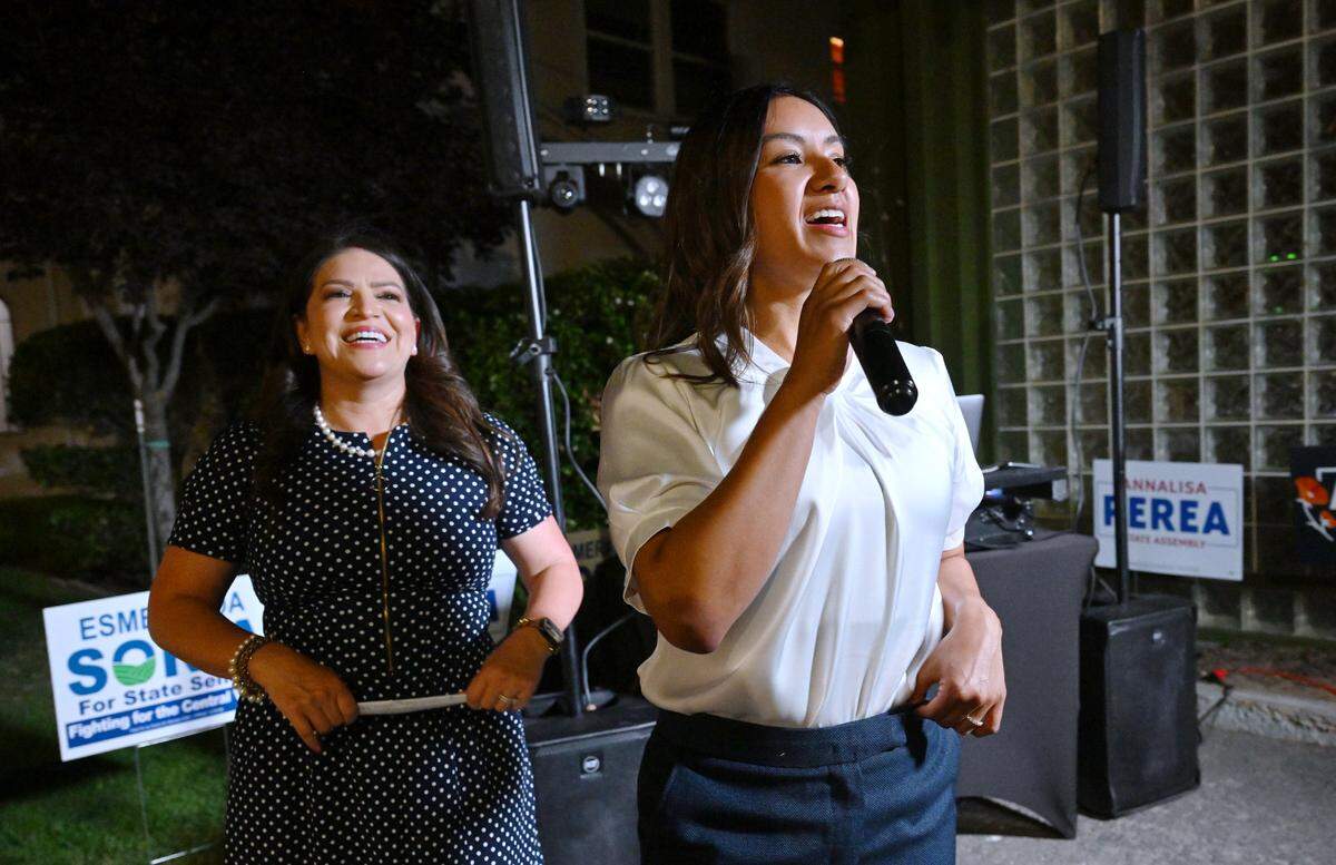 Annalisa Perea, right, thanks supporters with Esmeralda Soria to the left during a campaign gathering Tuesday night, June 2, 2026 in Fresno.