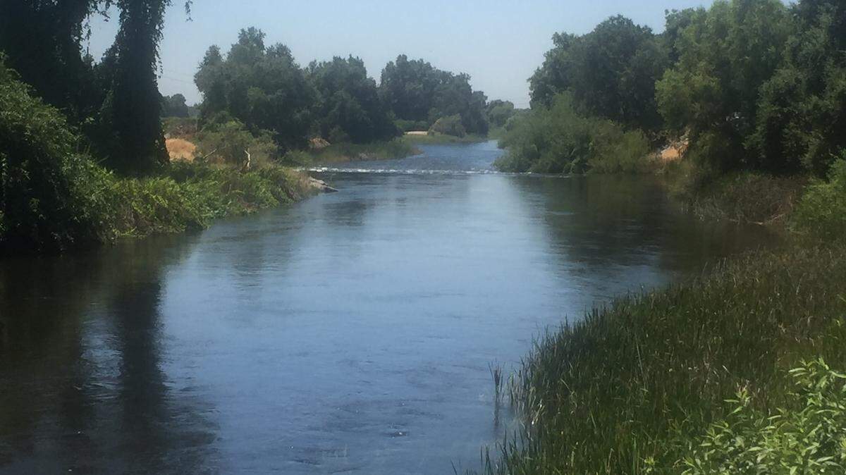 The Kaweah River near Woodlake, where a 7-month-old baby boy and a man fell in June 26. The baby is in stable condition, and the man who rescued him is out of the hospital.
