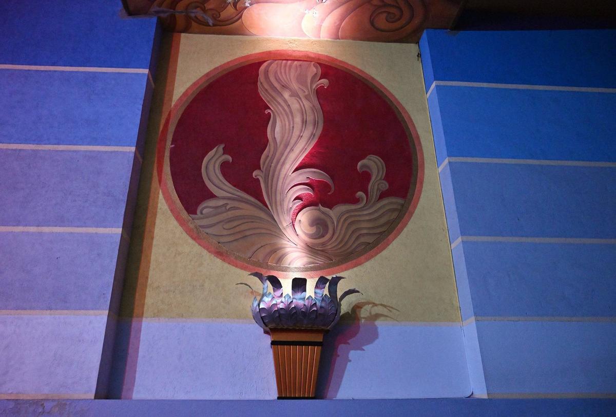 Lighting sconces maintain the art deco theme within the historic Tower Theatre, a year after new management began. Photographed Thursday, July 11, 2024 in Fresno.