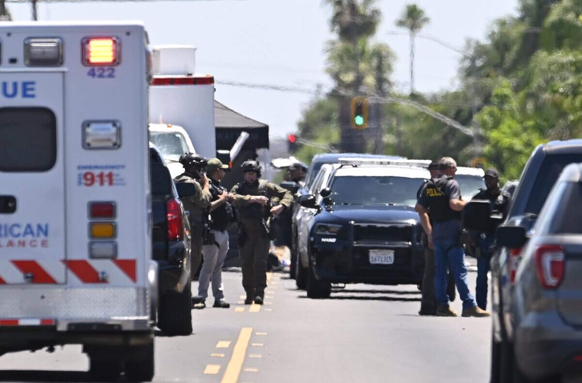 Law enforcement are seen at the location of an officer involved shooting on Cedar and Eugenia avenues south of Church Avenue Friday afternoon, June 5, 2026 in Fresno.