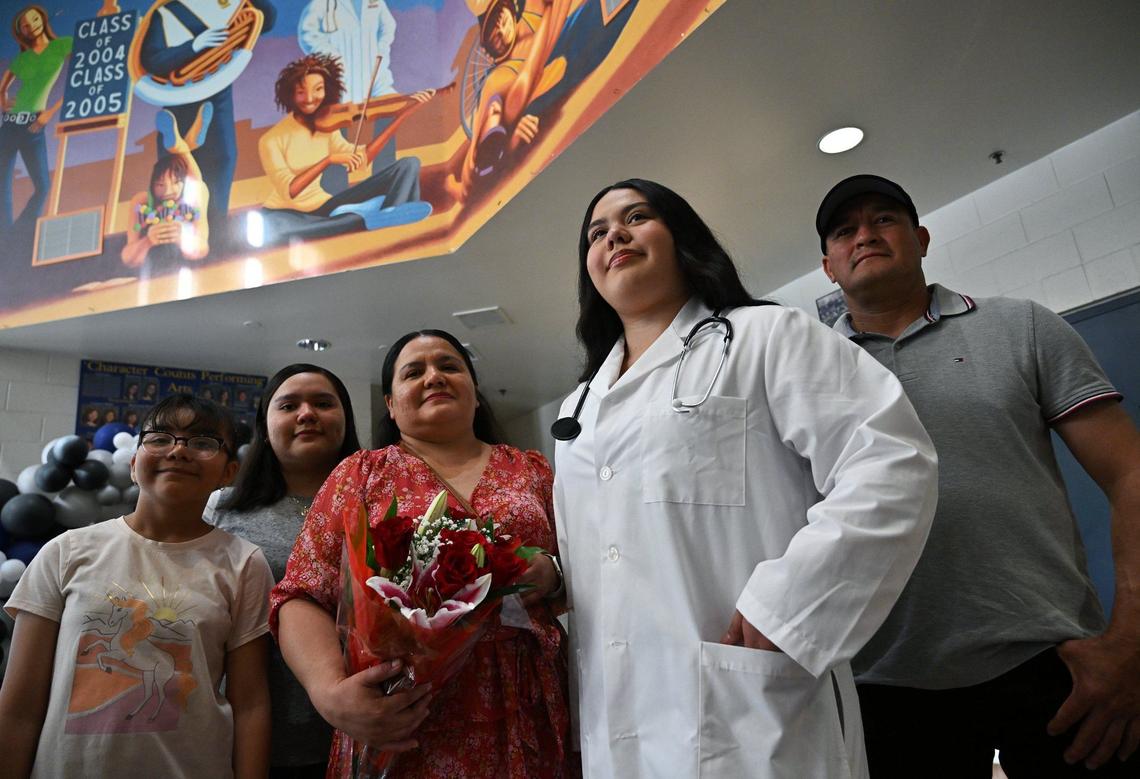 Mariela Lozano, 18, second from right, is a graduate of Sunnyside High’s Doctors Academy. Photographed with her family Wednesday, May 15, 2024 in Fresno. Family members left to right, sister Ashley Lozano, 10, Wendy Lozano, 20, mother Rosa Lozano and father Guimel Lozano.
