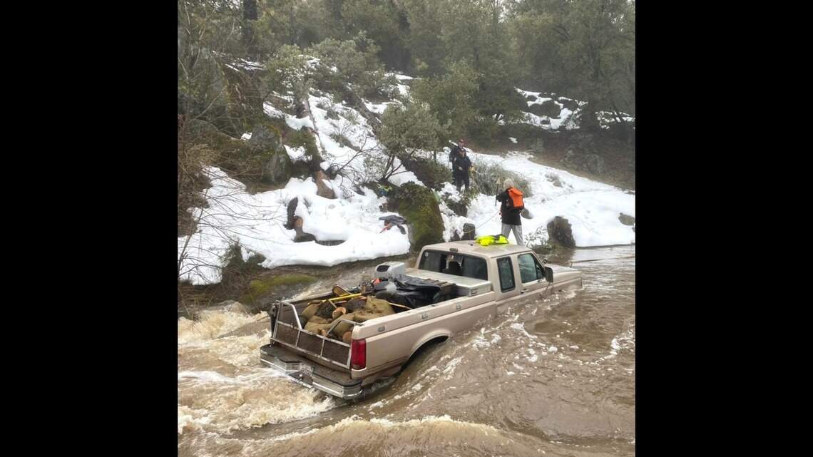 Stranded driver rescued from flooded road. ‘Stay away from the water,’ Madera sheriff says