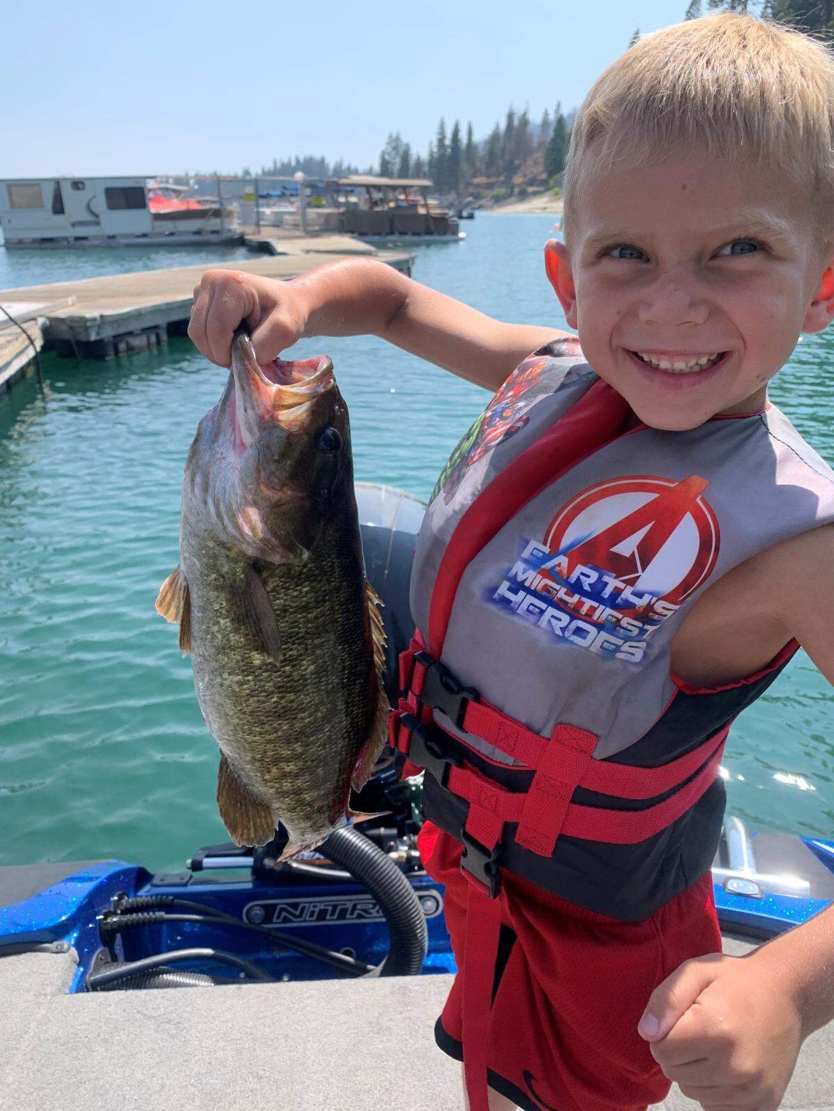 Logan Daves shows off his Aug. 10 catch at Shaver Lake measuring 3.04 pounds and 18 inches. He used a 2.8 Keitech.