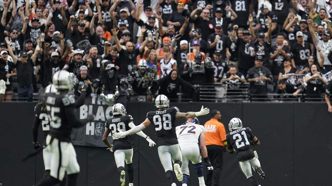 Las Vegas Raiders cornerback Amik Robertson runs back a fumble for a touchdown against the Denver Broncos during the first half of an NFL game, Sunday, Oct. 2, 2022, in Las Vegas.