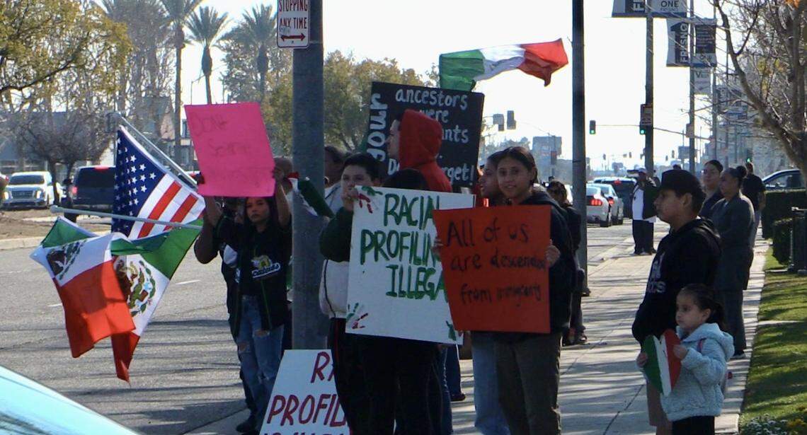 Demonstrators gather on Sunday, Jan. 12, 2025 over the raids that occurred in Kern County this week.