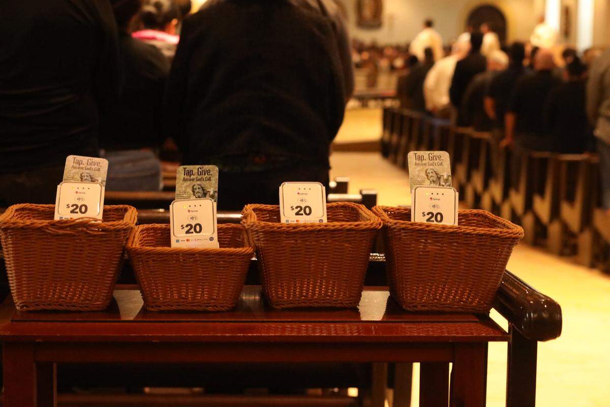 The collection baskets at two&nbsp;Central Valley-area Catholic churches have gone high-tech, with credit card readers strapped to the sides as the straw woven baskets are passed down rows of pews so parishioners can&nbsp;tap&nbsp;in $20 or $40 donation increments&nbsp;during mass.