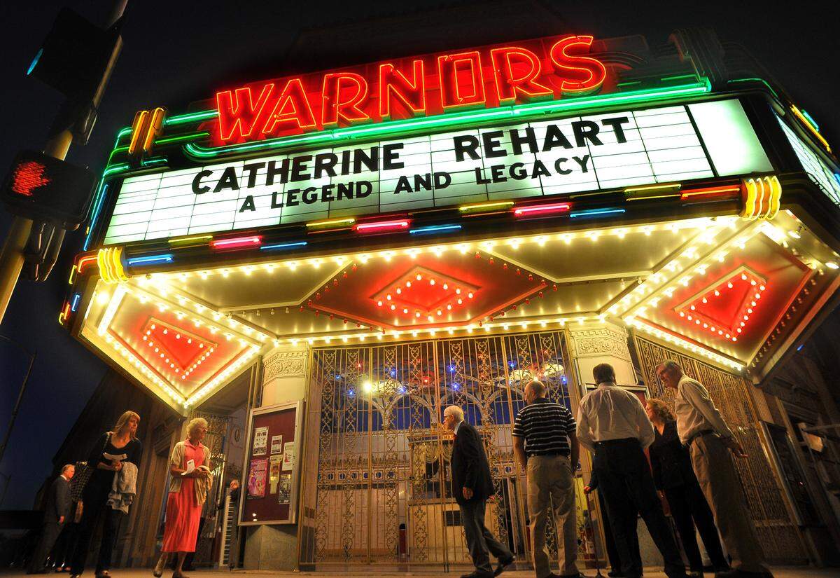Friends and fans of Fresno historian Catherine Morison Rehart, gather outside the historic Warnors Theater after her memorial service Monday, Oct. 14, 2013. Her research was turned into “Legends and Legacies” books about the Valley and more than 2,000 spots on KMJ radio. Rehart died in Oregon on Sept. 6 of cancer. She was 73.