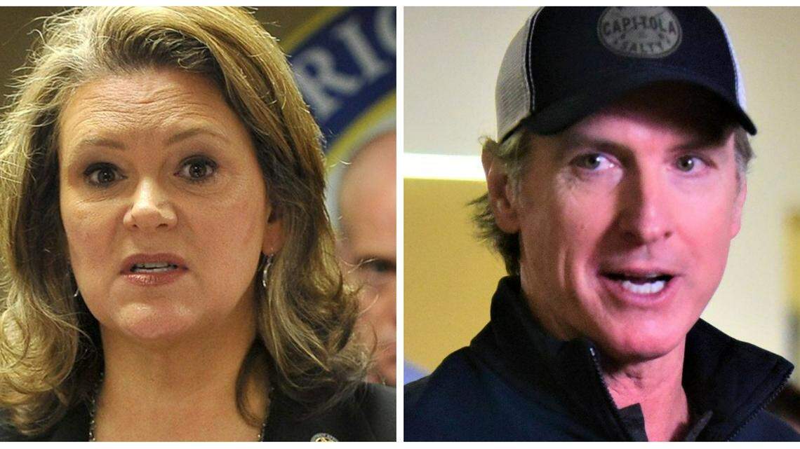 Fresno County DA Lisa Smittcamp, left, and California Governor Gavin Newsom, right