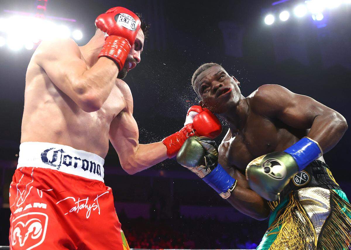 Jose Ramirez connects with a left upper cut to Richard Commey’s jaw during their junior welterweight fight at Save Mart Center on March 25, 2023 in Fresno, California.