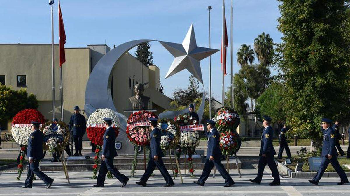 U.S. Air Force personnel walk past an entry at Incirlik Air Base in Turkey.