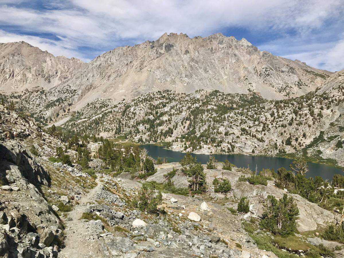 Backpackers on the Rae Lakes Loop in Kings Canyon National Park are treated to sweeping views of the Sierra Nevada. The trek’s popularity also attracts bears that raid campsites in search of a quick, calorie-rich meal. Bear sightings and activity are common.