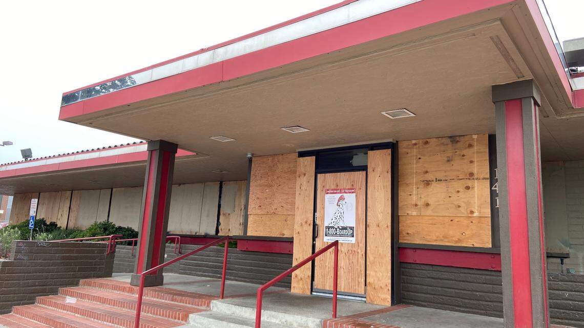 The main entrance to the downtown Fresno Denny’s is boarded up after a Nov. 22 fire.