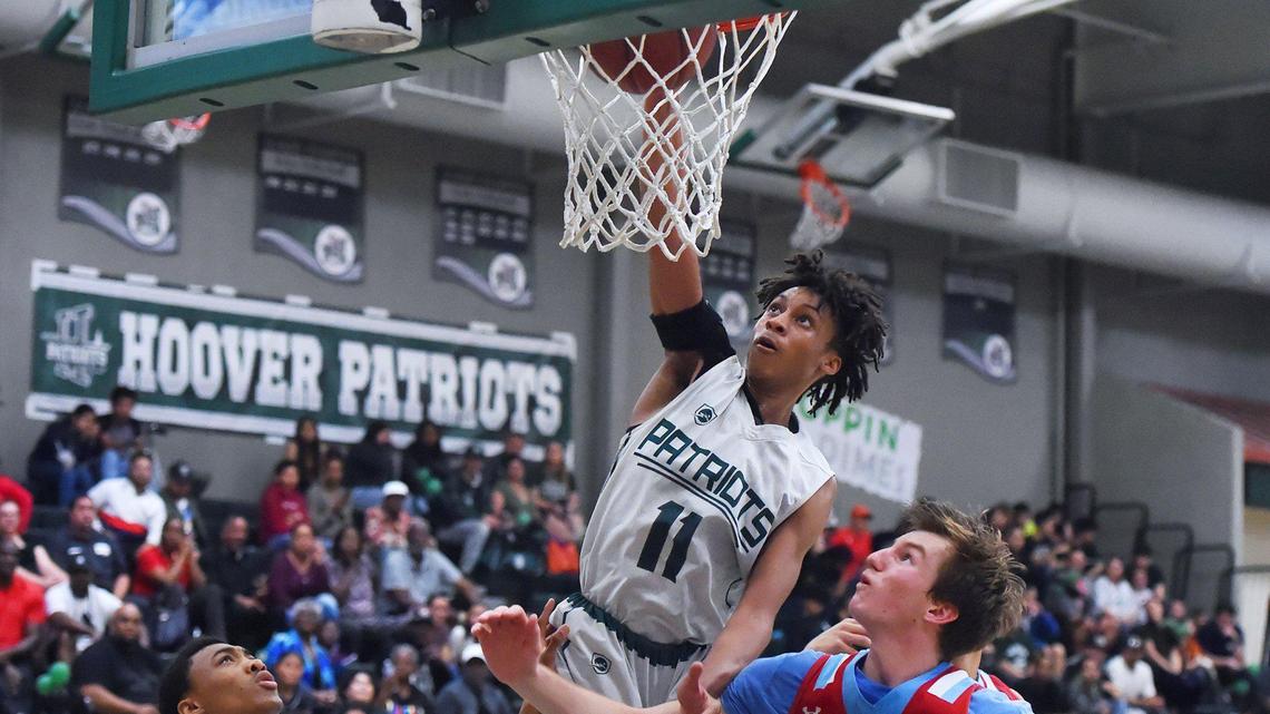 Hooover’s AJ George, dunking in a 2020 CIF regional playoff game, is up for High School Athlete of the Week after scoring 49 points last week against Central.