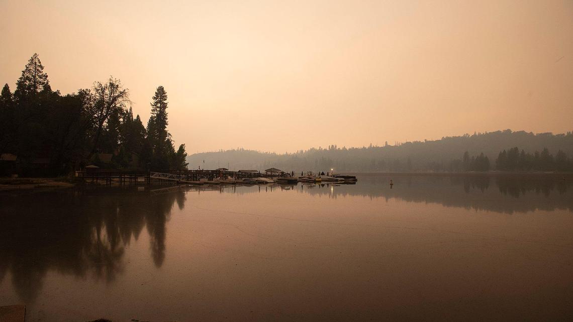 Smoke from the nearby Creek Fire fills the air over Bass Lake in Bass Lake, Calif, on Sunday, Sept. 6, 2020.