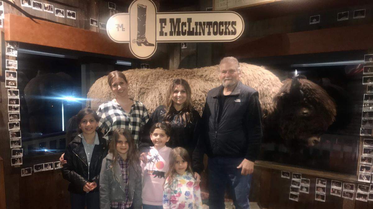 Jill with her family and F. McLintocks’ famous entry host.