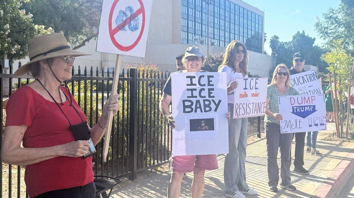 Protesters gather across from ICE’s office in Fresno.
