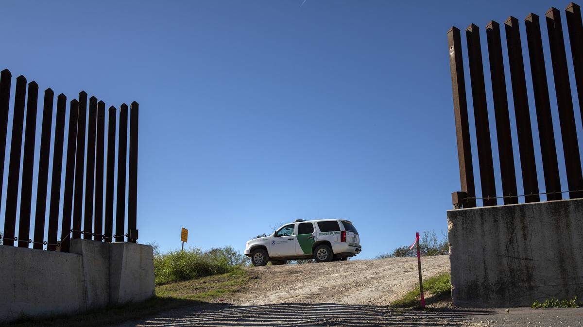 A Border Patrol vehicle parked at an opening in the fence near Brownsville, Texas, Jan. 20, 2019.