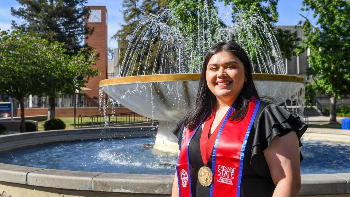 Lizbeth Cortez Villa, photographed on the campus of Fresno State, will graduate with a bachelor’s degree from the Kremen School of of Education and Human Development on Friday.