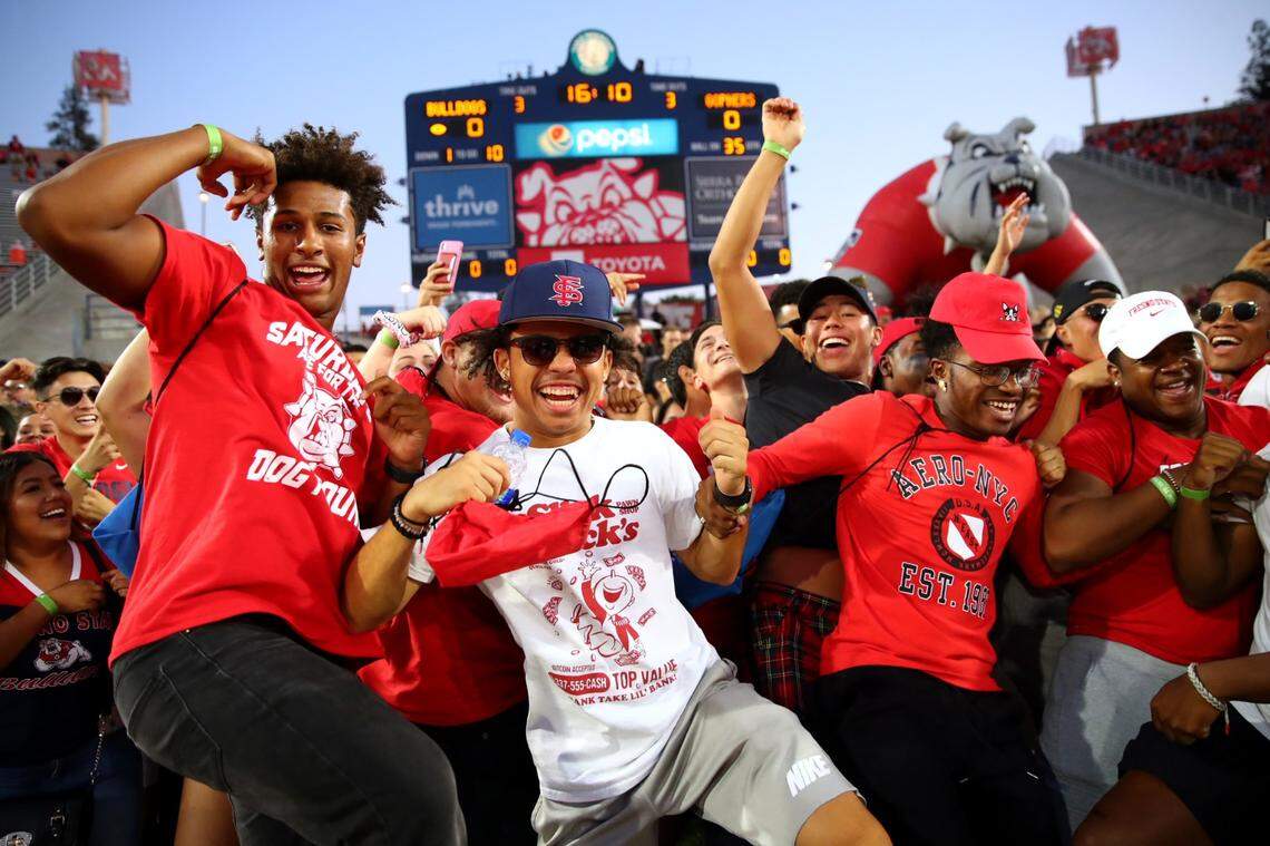 Fresno State wideout Jordan Brown, center, prepares to sprint across the field at Bulldog Stadium during Run to Victory in 2019 when he was a freshman. Brown joined the football team that spring through an open tryout.