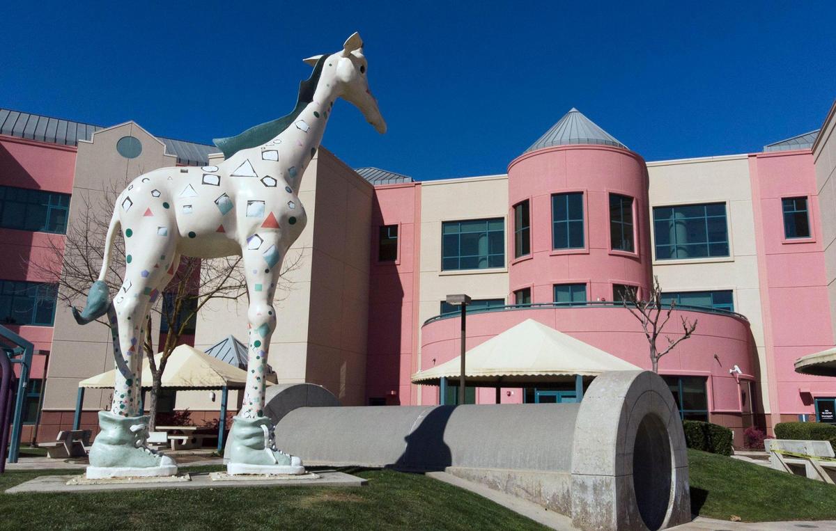 Valley Children’s Hospital, which moved to its location along the San Joaquin River in Madera County in 1998. The campus features brightly colored buildings and a statue of George the giraffe, the hospital mascot.