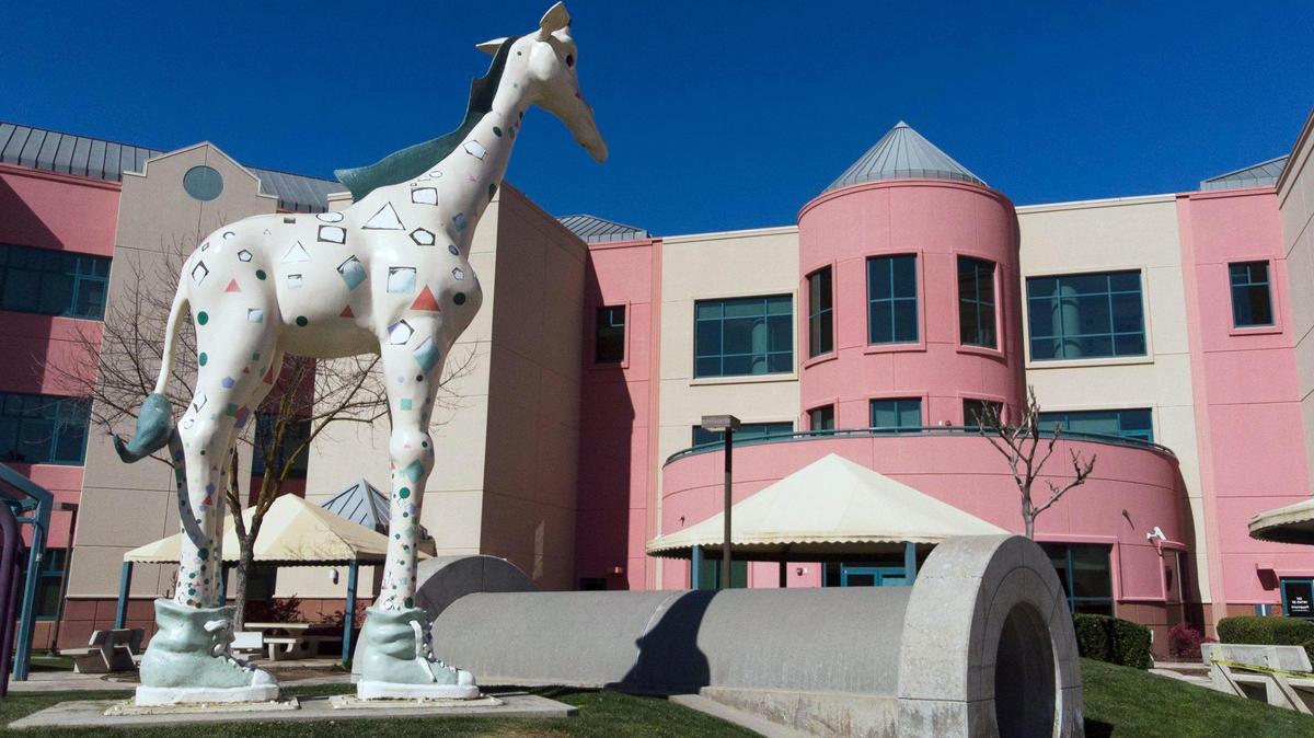 Valley Children’s Hospital, which moved to its location along the San Joaquin River in Madera County in 1998. The campus features brightly colored buildings and a statue of George the giraffe, the hospital mascot.