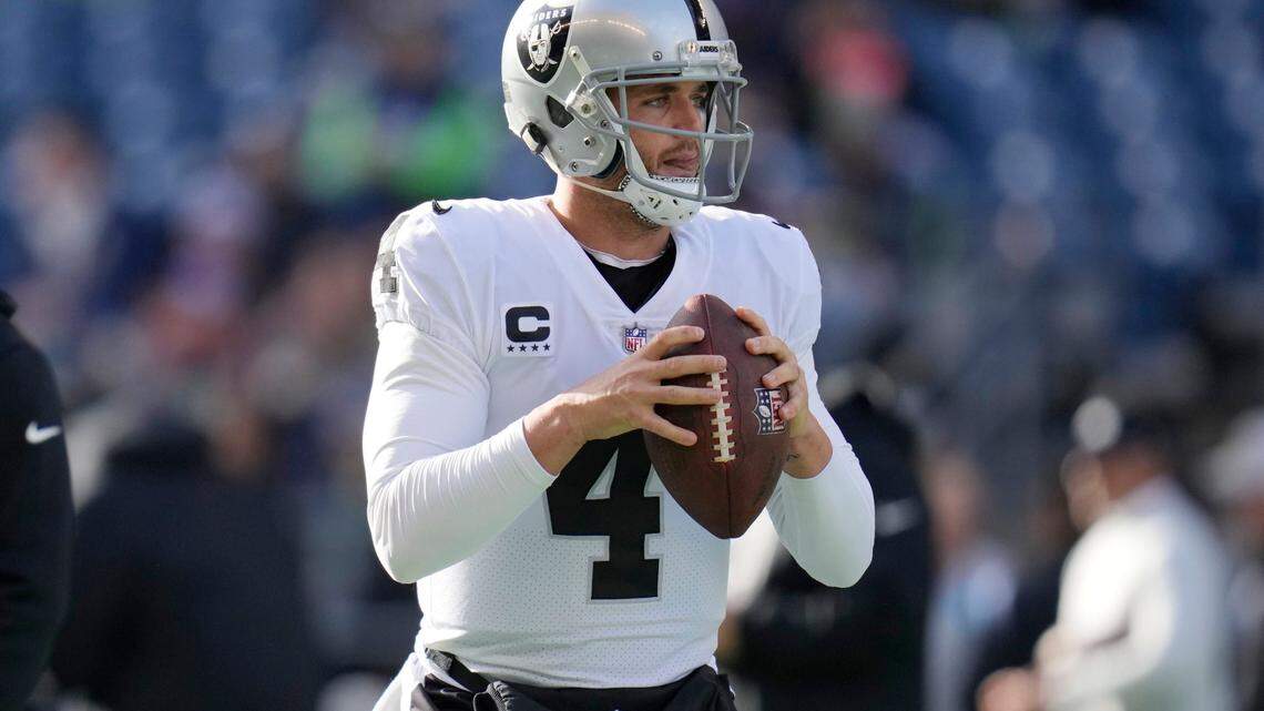 Las Vegas Raiders quarterback Derek Carr warms up before an NFL game against the Seattle Seahawks on Sunday, Nov. 27, 2022, in Seattle.