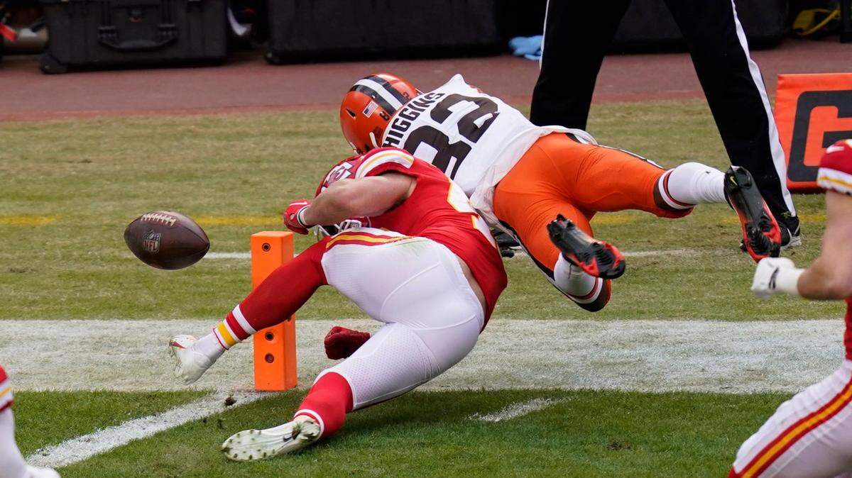 Cleveland Browns wide receiver Rashard Higgins (82) fumbles the ball over Kansas City Chiefs safety Daniel Sorensen at the goal line during the first half of an NFL divisional round football game, Sunday, Jan. 17, 2021, in Kansas City.