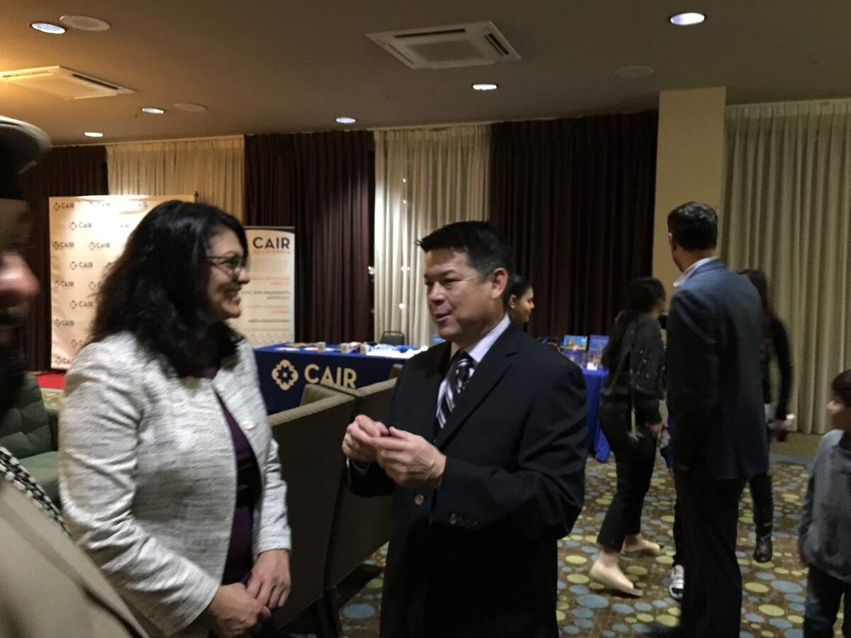 Michigan Congresswoman-elect Rashida Tlaib and California Congressman-elect TJ Cox speak during an event hosted by the Council on Islamic American Relations in Fresno, Calif. on Dec. 1, 2018.