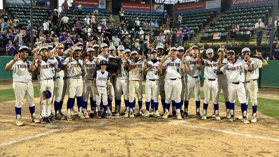 Top-seed Lemoore poses after defeating No. 7 Wasco 3-1 in the Central Section Division IV championship game at Valley Strong Ballpark in Visalia on Thursday, May 28, 2025