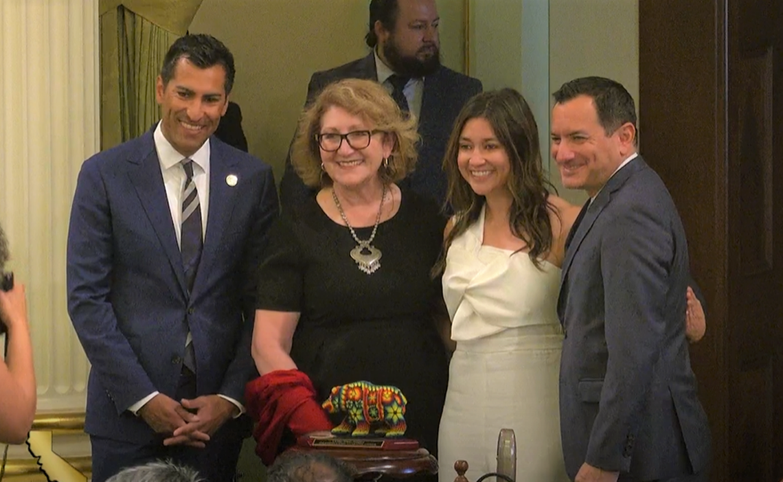 Latino Caucus Chair María Elena Durazo, Vice-Chair Robert Rivas and Speaker Anthony Rendon with Jenna C. Contreras (Achievement in Journalism & Media), who was recognized during the 20th annual Latino Spirit Awards on each floor of the legislature on May 2.