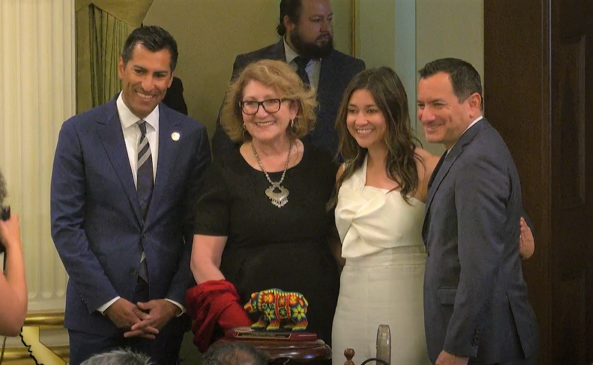 Latino Caucus Chair María Elena Durazo, Vice-Chair Robert Rivas and Speaker Anthony Rendon with Jenna C. Contreras (Achievement in Journalism & Media), who was recognized during the 20th annual Latino Spirit Awards on each floor of the legislature on May 2.