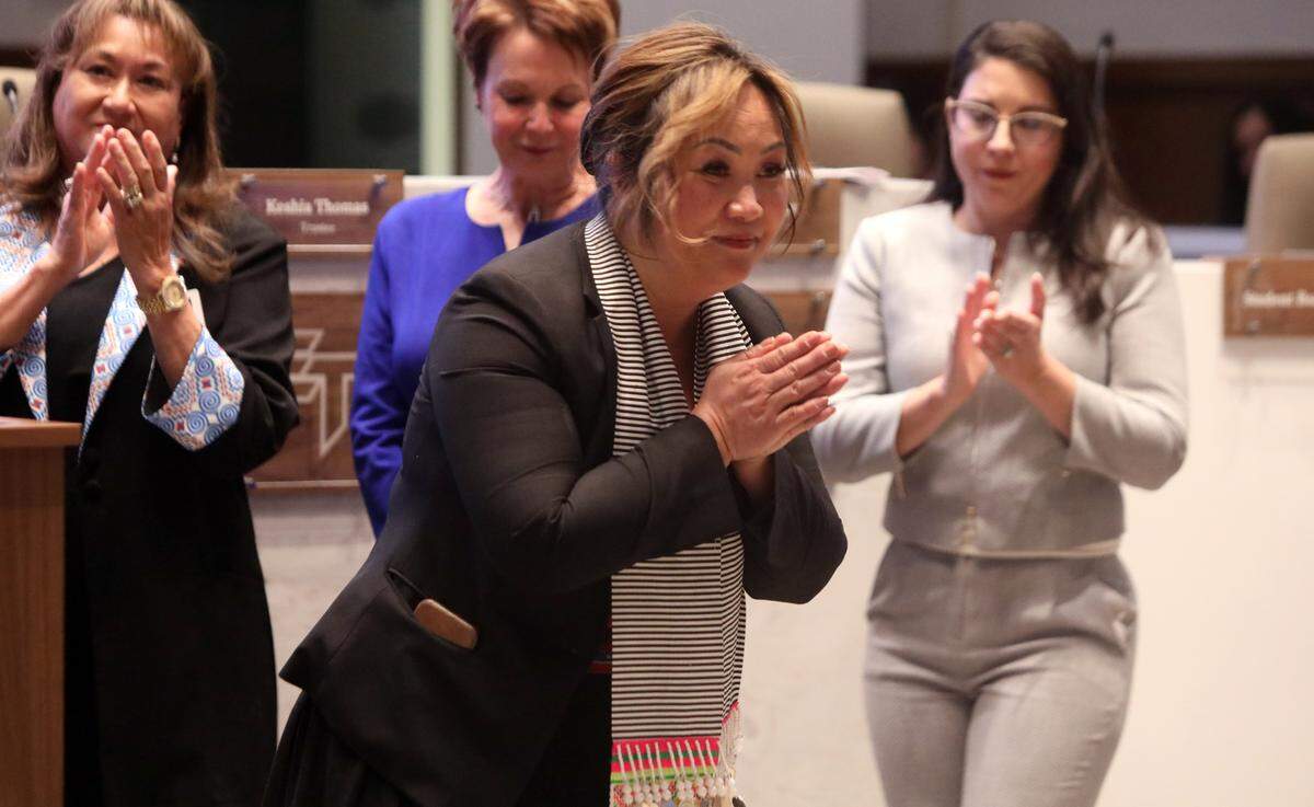 Misty Her, who was named the finalist as superintendent for the Fresno Unified School District on April 23, 2025, gives a Hmong thank you after a 6-1 vote. She becomes the first woman, and first Hmong, to lead the state’s third-largest school district.