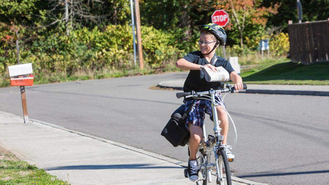 The paper boy was a familiar sight in America decades ago. Today the job is handled by adults early in the morning.