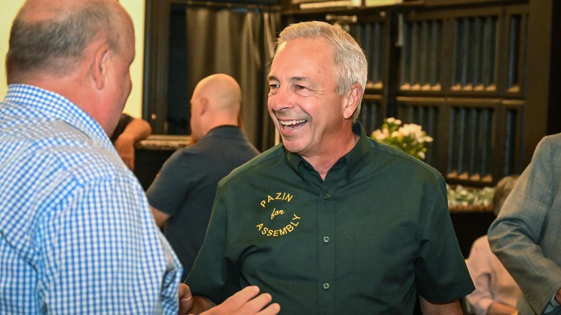 California Assembly District 27 candidate Mark Pazin talks with supporters during a victory party at the Fresno Deputy Sheriff’s Association building in downtown Fresno on Tuesday, June 7, 2022.