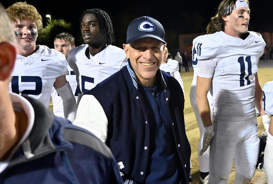 Central Valley Christian’s head coach Don Arax, center, smiles after the team’s 28-7 win over Golden West in the D2 semifinal championship game Friday night, Nov. 22, 2024 in Visalia. CVC will face Bakersfield in next week’s final.