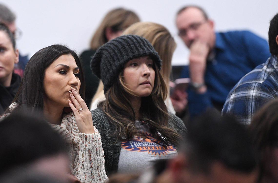 Members of the audience listen to discussion before the Clovis Unified School Board voted to adopt new COVID protocols in a special governing board meeting Wednesday, Feb. 23, 2022 in Clovis.
