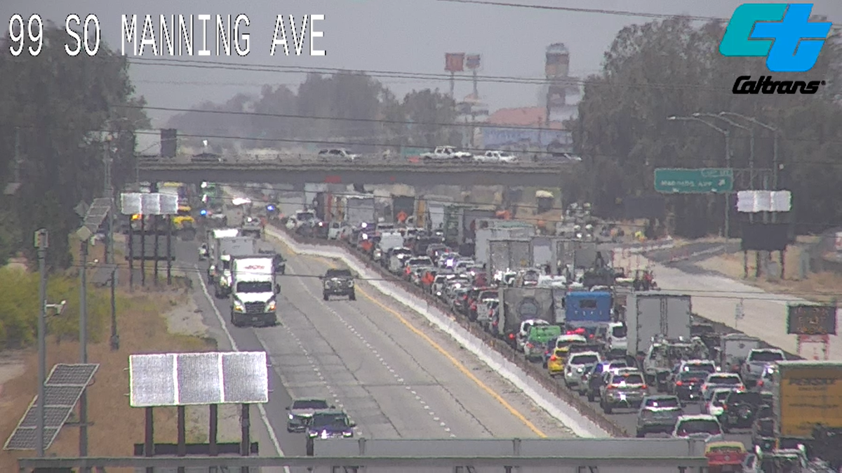 Traffic is stopped on Highway 99 in Fresno, CA following a big rig collision on Wednesday, June 8, 2022.