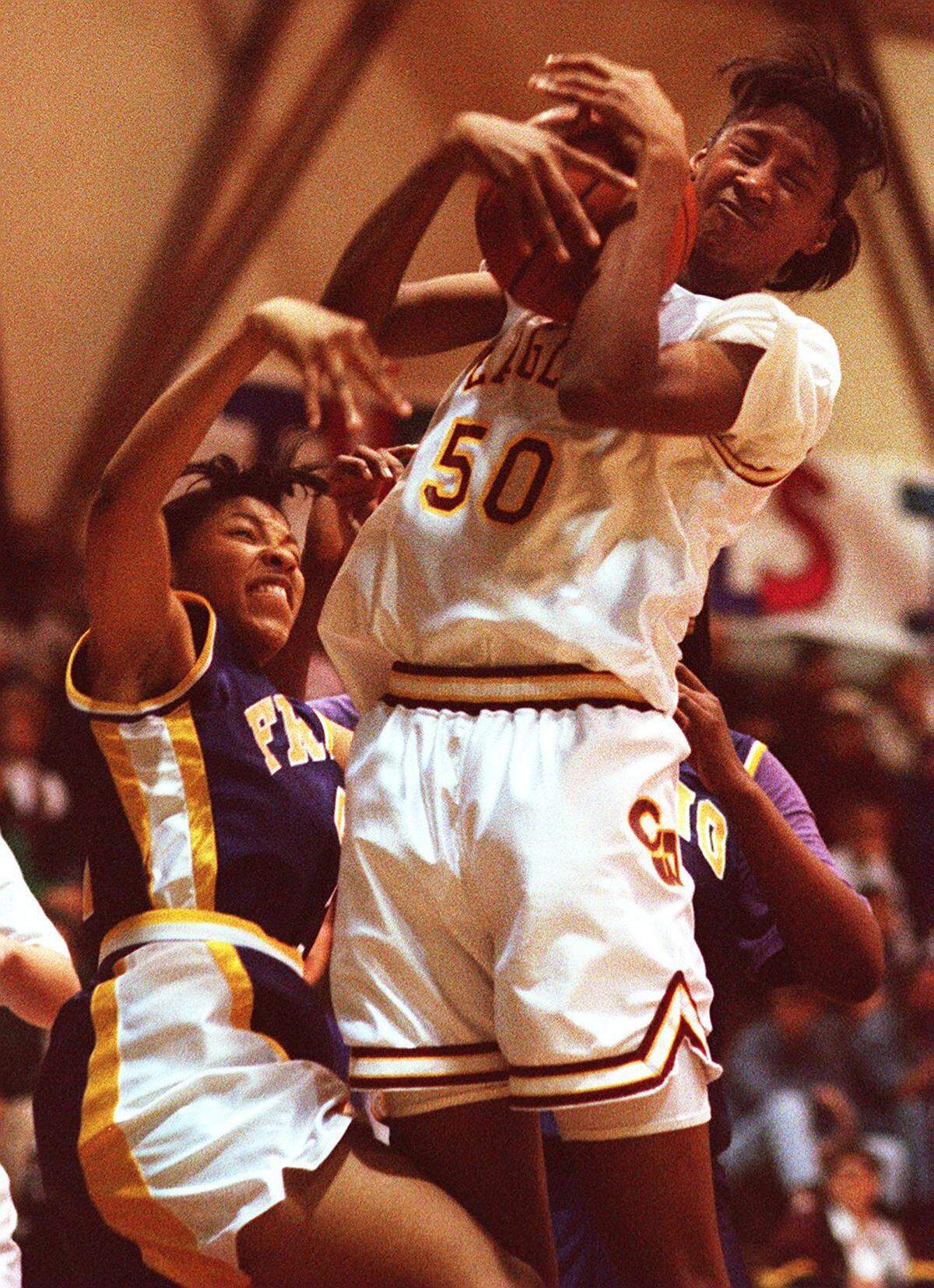 Rising above. Opposing coaches say Adrian Williams, right, has lifted a good Clovis West team to a great one.