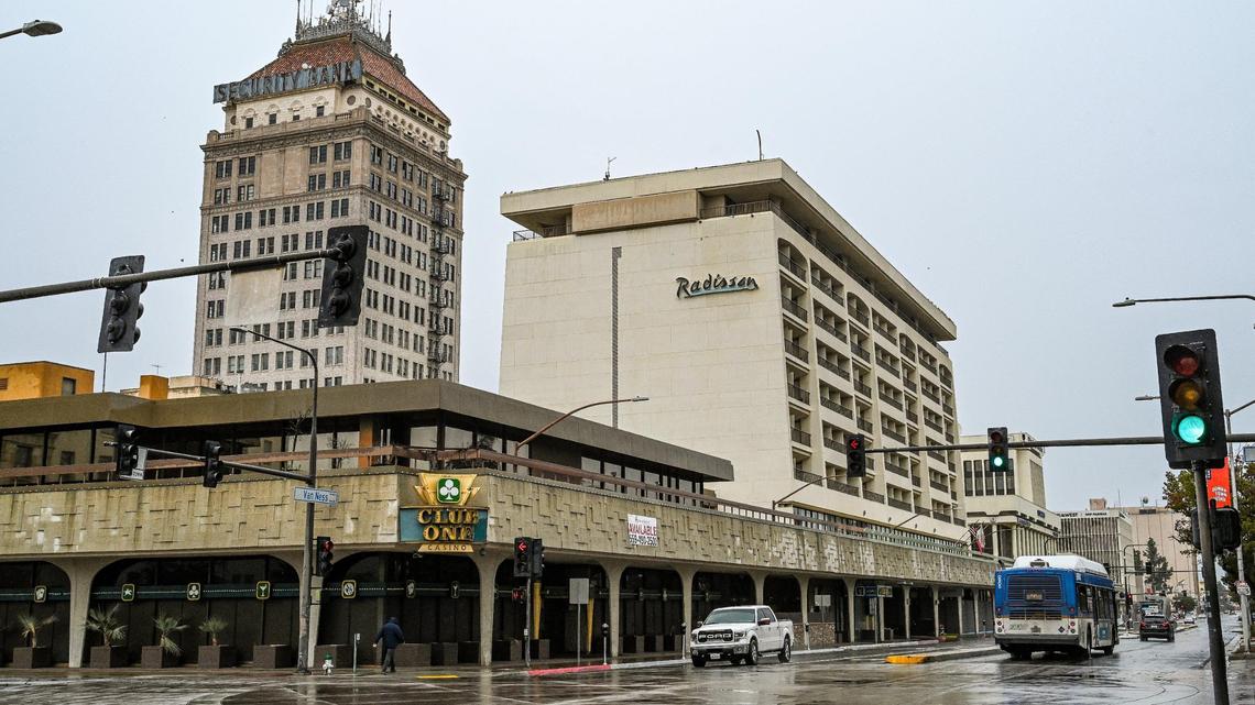 The Radisson Hotel building as seen near the former Club One Casino and the Pacific Southwest Building on Van Ness Avenue in downtown Fresno on Thursday, Dec. 29, 2022. The City of Fresno shut down the popular hotel on Wednesday due to fire code violations.