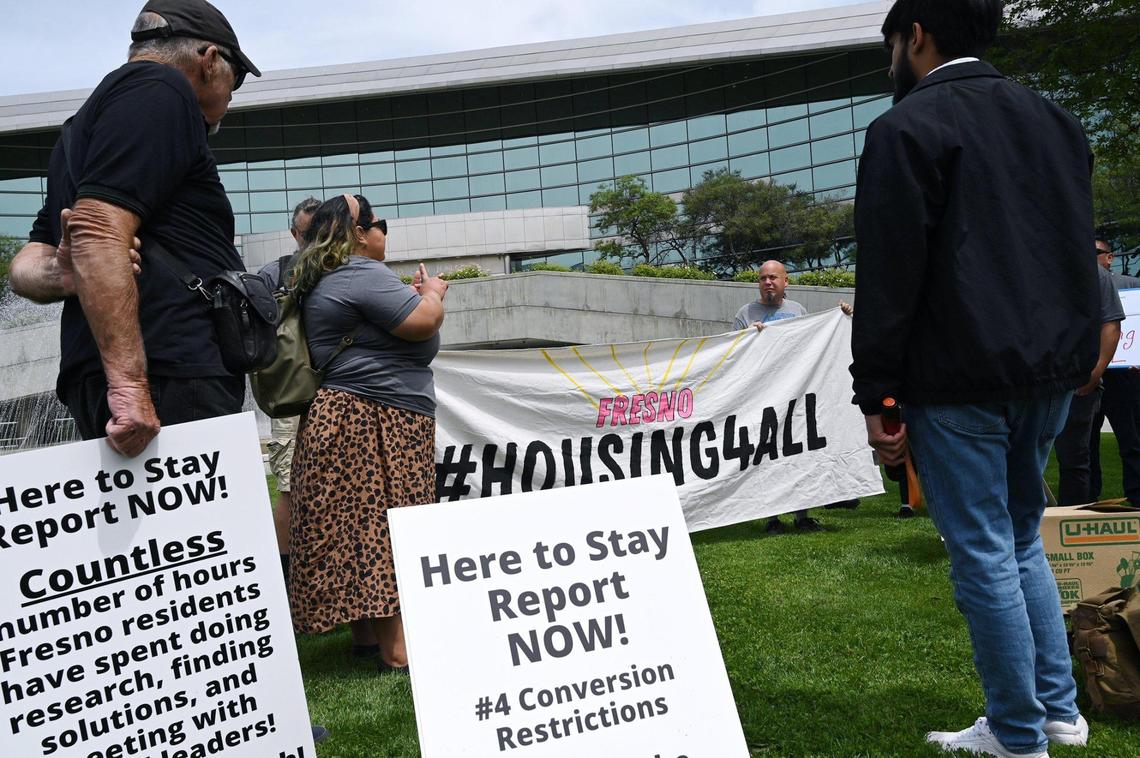 A group of protesters unhappy with the city’s plans gather outside Fresno City Hall before the start of a special meeting of the city council for presentations ofthe City of Fresno’s housing plans in answer to the housing crises Wednesday, April 27, 2022 in Fresno.