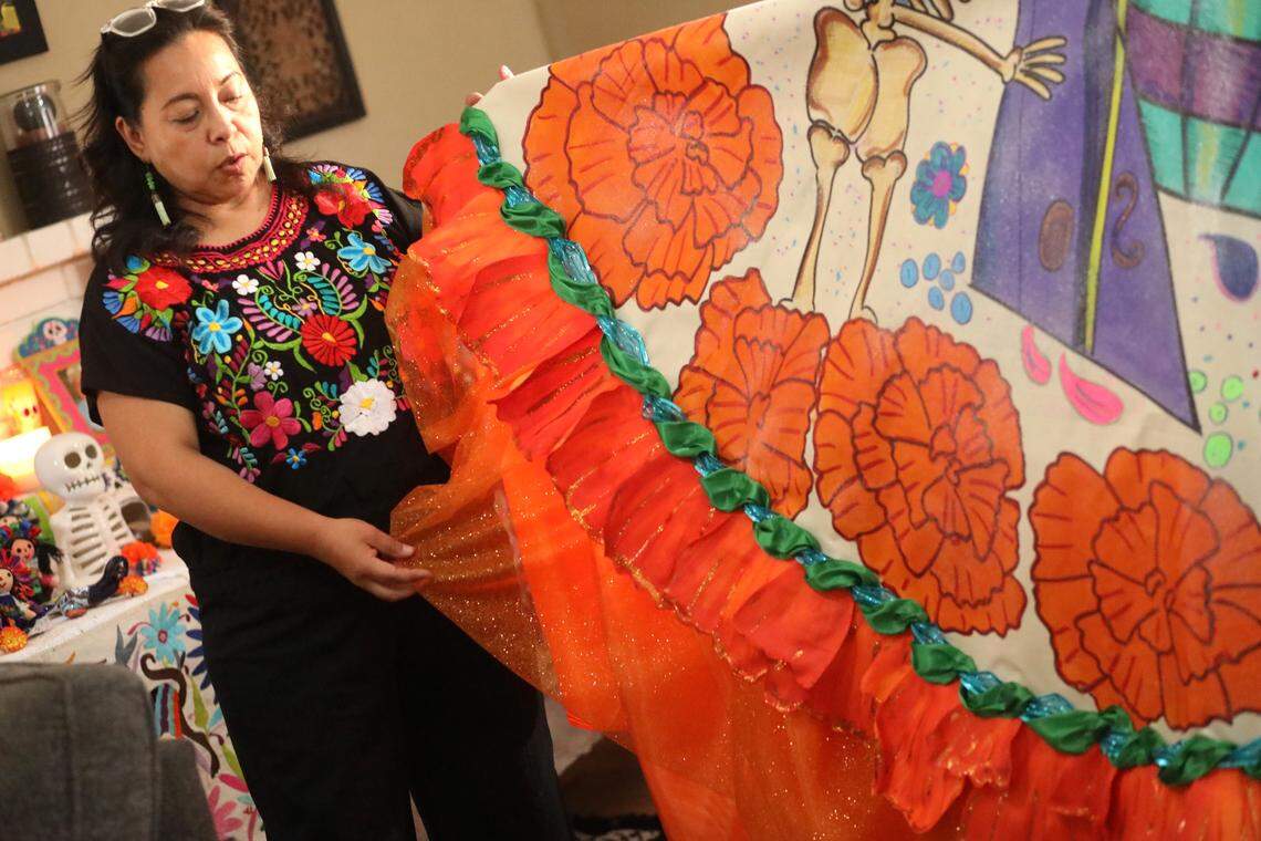 Leticia Valencia has brought La Catrina of Visalia to life for over a decade. She and her husband, Claudio Martínez, create the dresses La Catrina wears each year.