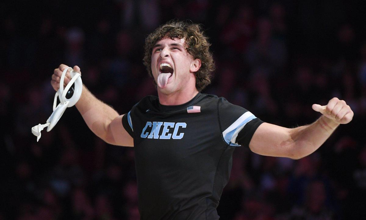 Clovis North’s Paul Sharp celebrates after beating Buchanan’s Caden Rodgers 5-3 int he 220lb bout at the CIF state wrestling championships held Sarurday, Feb. 26, 2022 in Bakerfield.