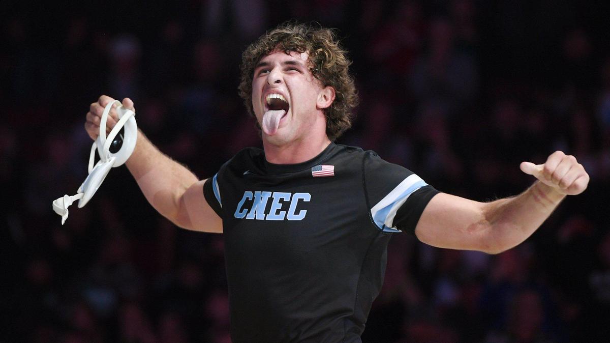 Clovis North’s Paul Sharp celebrates after beating Buchanan’s Caden Rodgers 5-3 int he 220lb bout at the CIF state wrestling championships held Sarurday, Feb. 26, 2022 in Bakerfield.