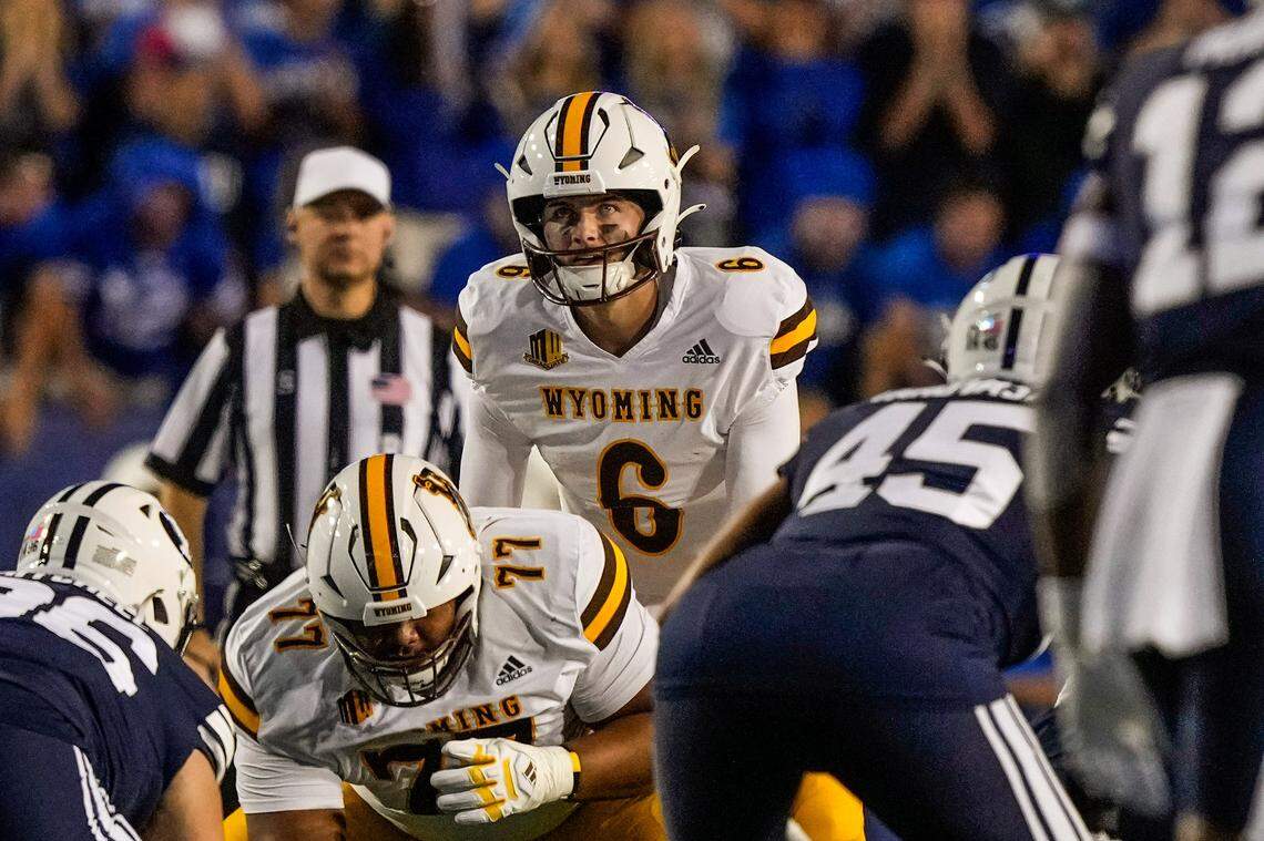 Wyoming quarterback Andrew Peasley has completed 52.8% of his passes with nine touchdowns and six interceptions.